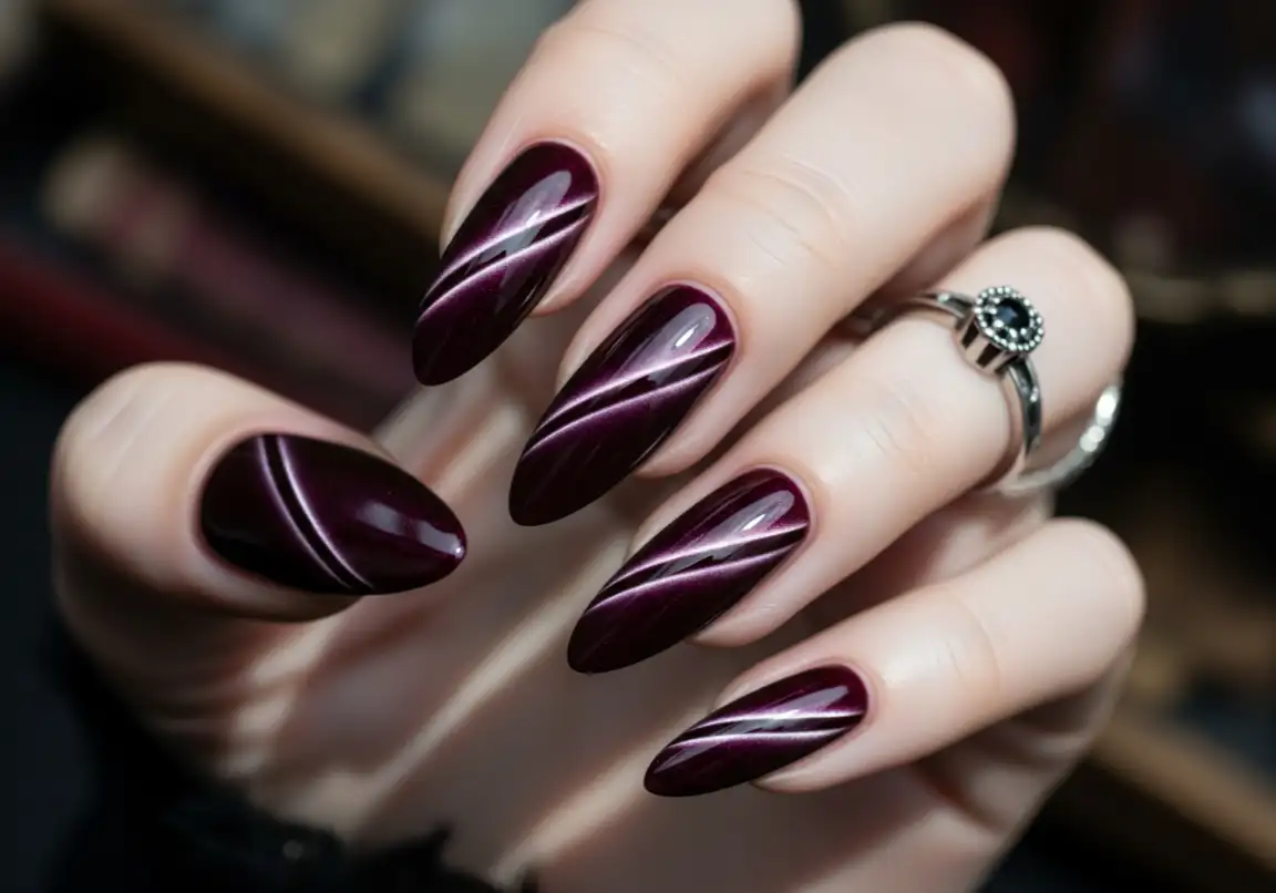 12. Cat-Eye with Gothic Flair
Grunge Nails